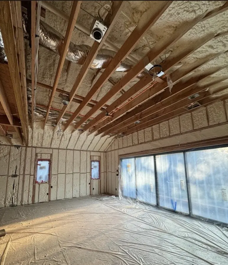Interior walls and ceiling insulated with spray foam during new construction in Tolland